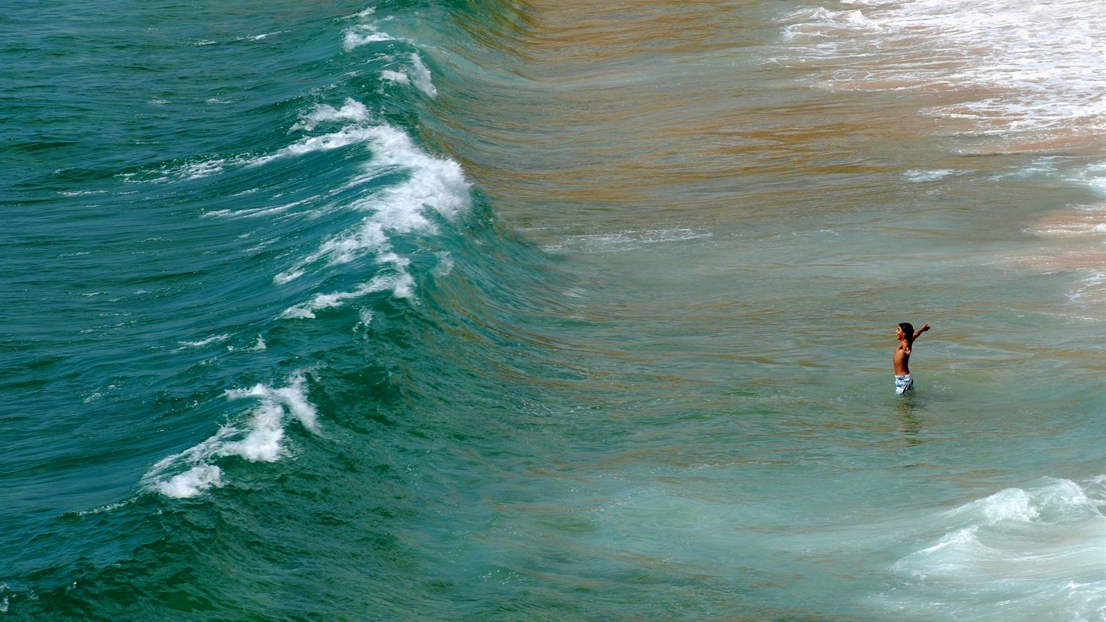 Rocky Atlantic coastline with waves breaking offshore